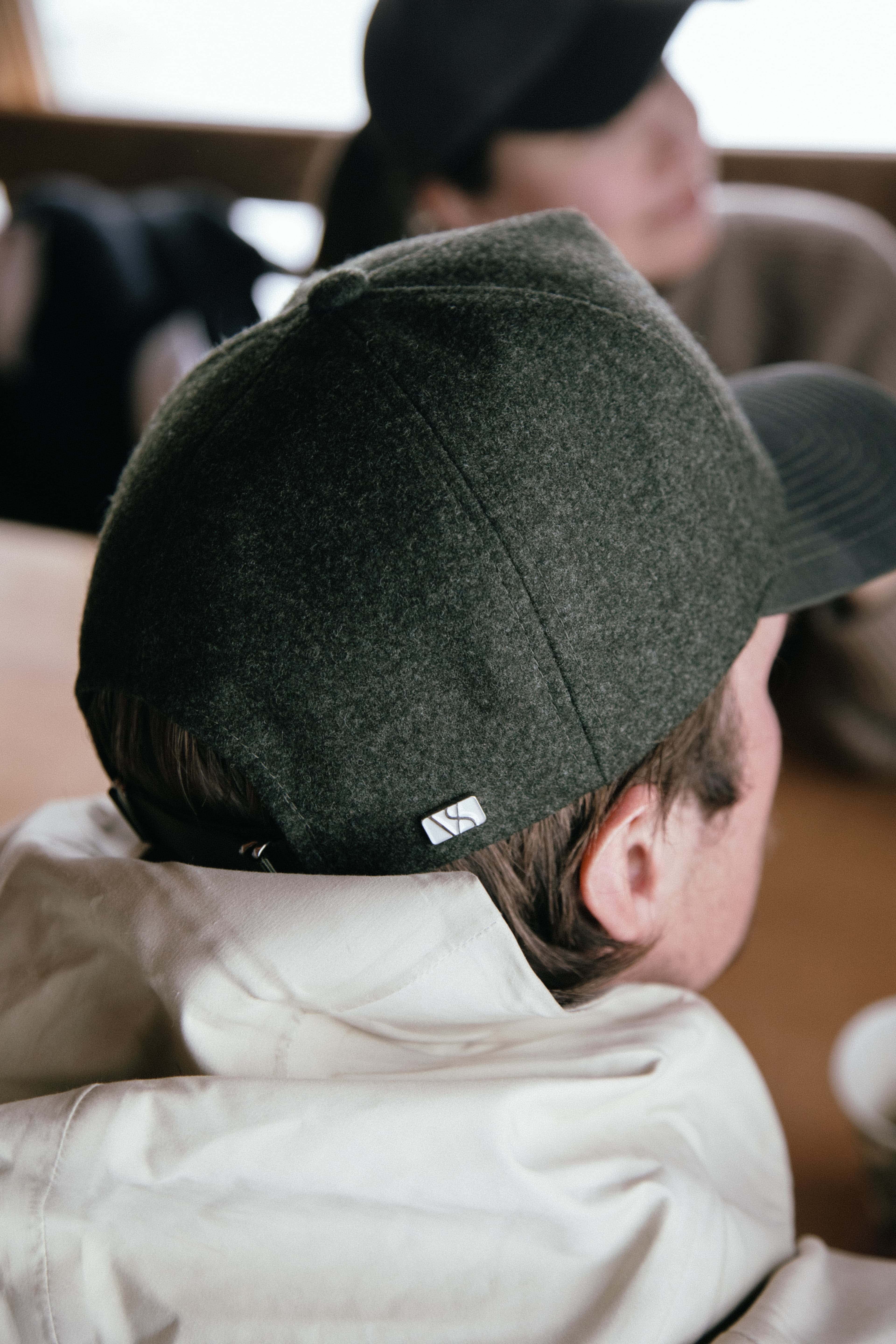 Back view of a forest ivy cruz cap