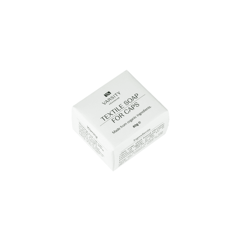 Front view of a Varsity Headwear textile soap to wash cap