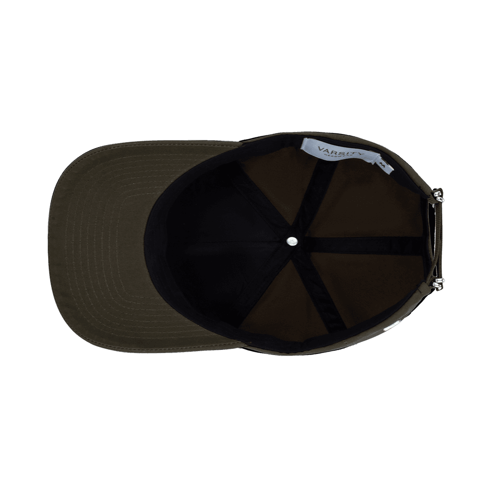 Inside view of a Varsity Headwear Ventile Cotton Cruz leather brown trucker cap