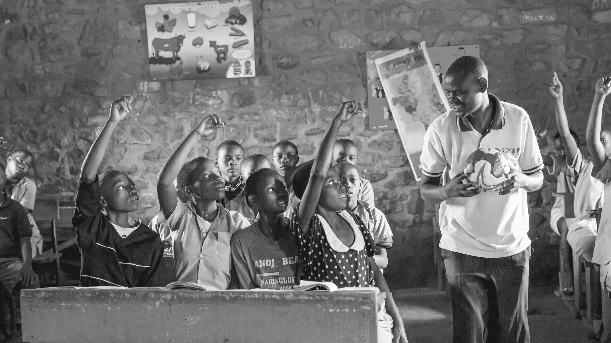 Black and white image of children at school