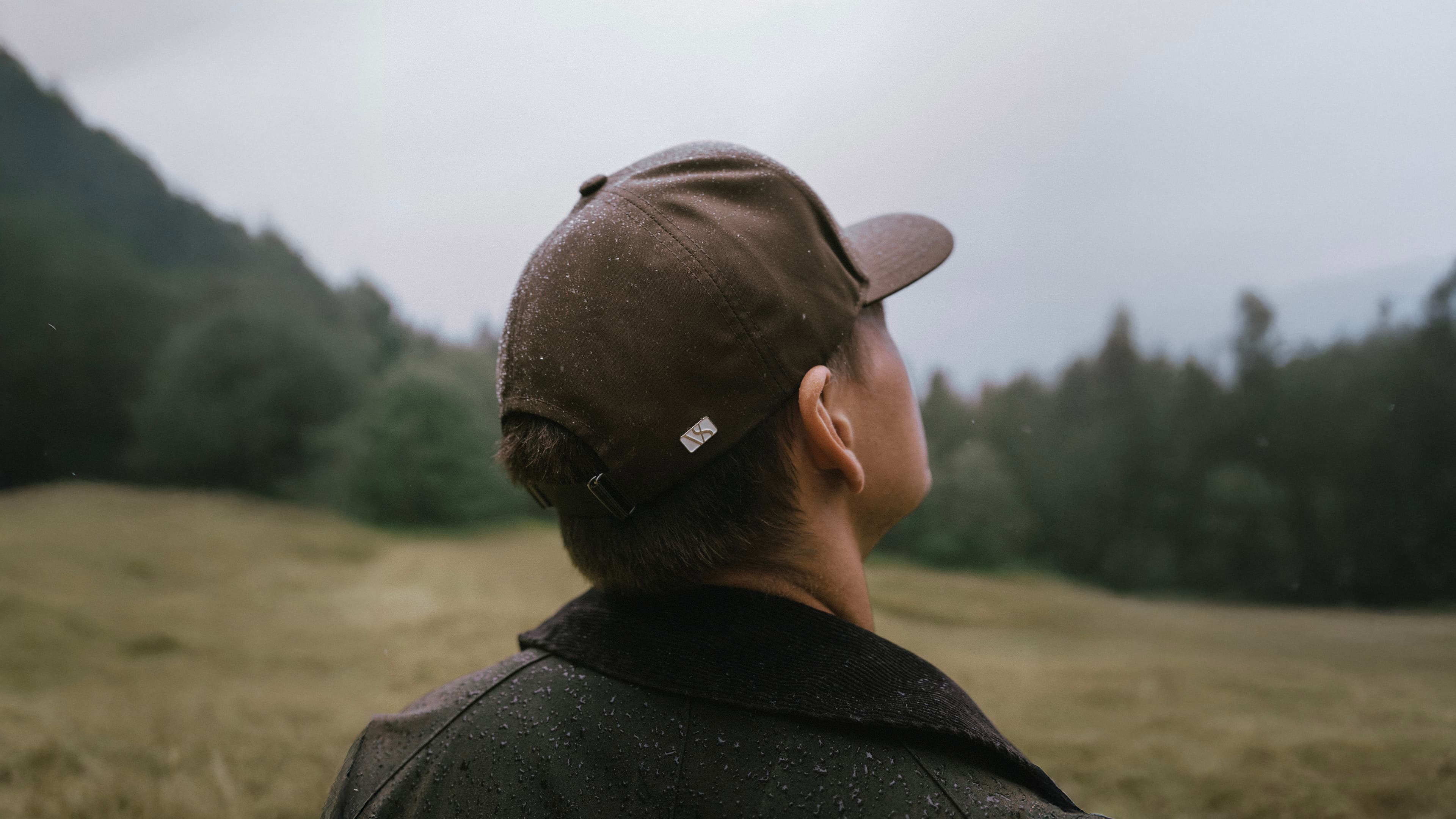Back view of male wearing a ventile cotton cruz structured cap from Varsity headwear